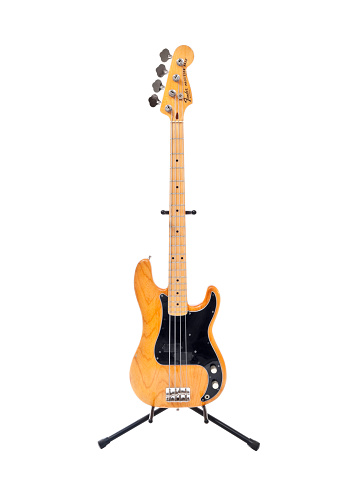 Los Angeles, California, USA - August 29th, 2009:  Illustrative editorial photo of a vintage Fender Precision electric bass guitar with an ash body and a maple neck.   