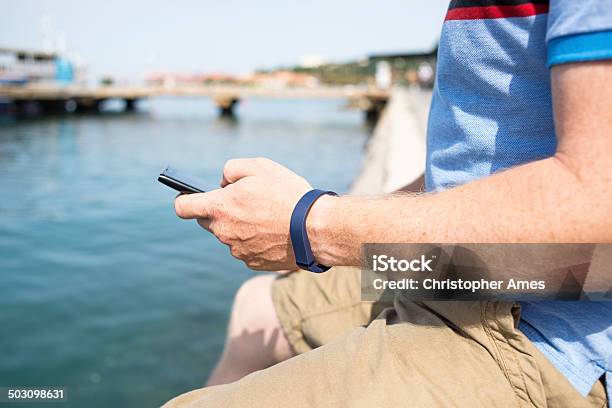 Getting Healthy With Activity Wristband Stock Photo - Download Image Now - Activity, Adult, Blue