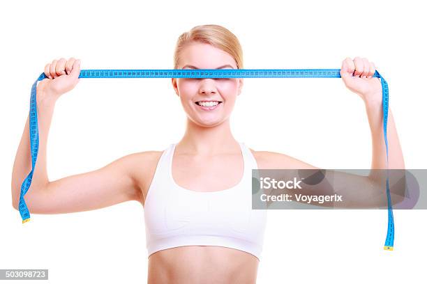 Fitness Girl Fit Woman Covering Her Eyes With Measuring Tape Stock Photo - Download Image Now