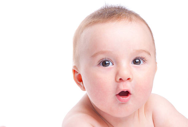 istock little baby looking with surprise 503101153