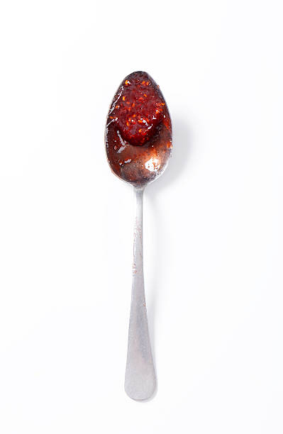 istock spoon of strawberry jam 503102483