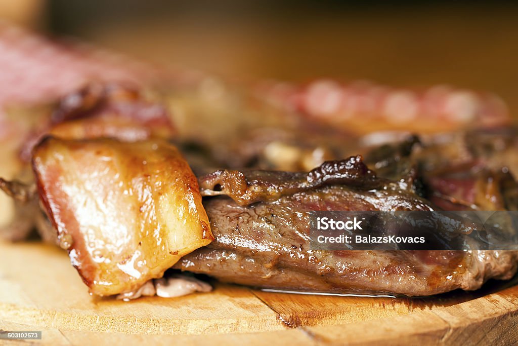 Baked wild rabbit meat with bacon Animal Body Part Stock Photo