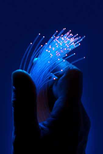 Fiber optik lighting cables in hand,
