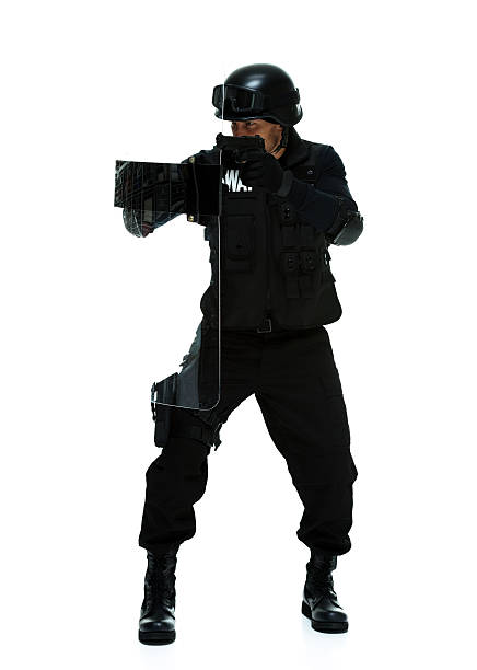 istock Police aiming with handgun 503104752