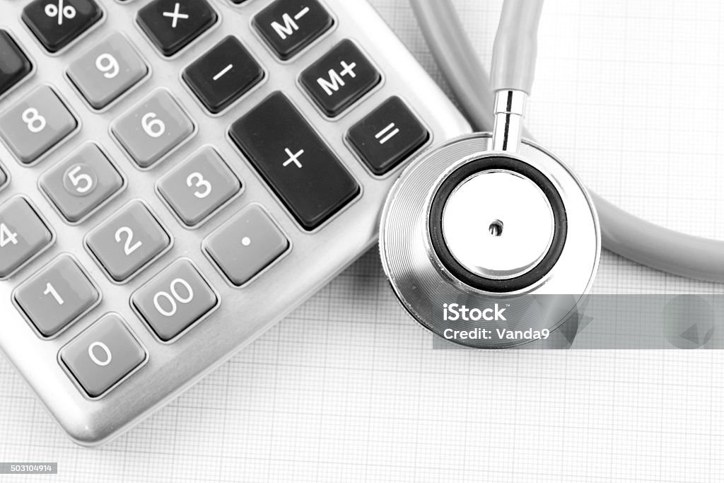 calculator and stethoscope Calculator Stock Photo