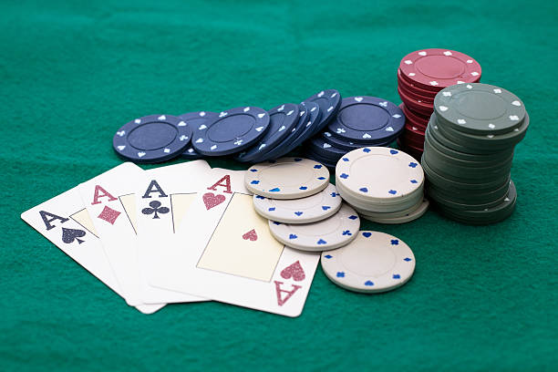 istock Ace poker beside lots of chips 503106566