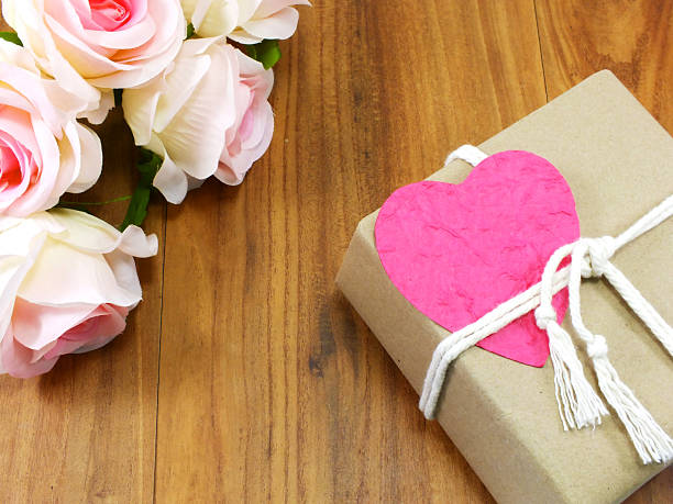 istock gift box with white rope and pink heart paper tag 503107966