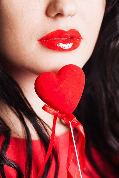 istock Girl with heart in hand 503111392