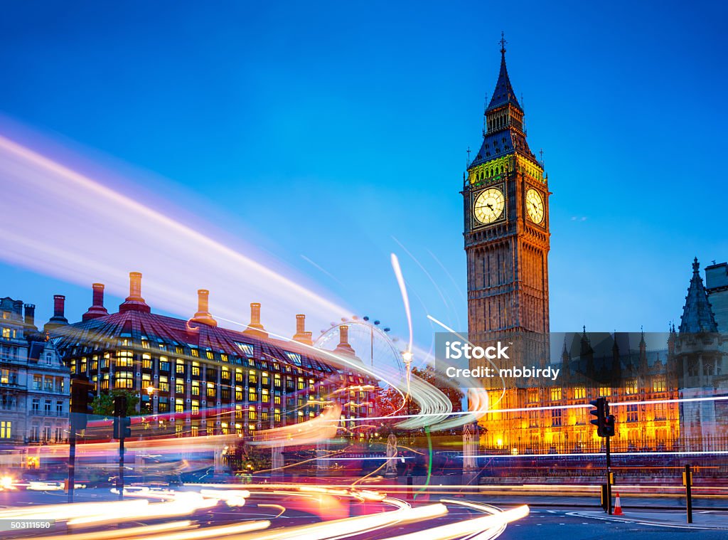 Big Ben, Westminster, London, UK Traffic light trails near Big Ben and the Houses of Parliament in background at dusk, Westminster, London, UK.  London - England Stock Photo