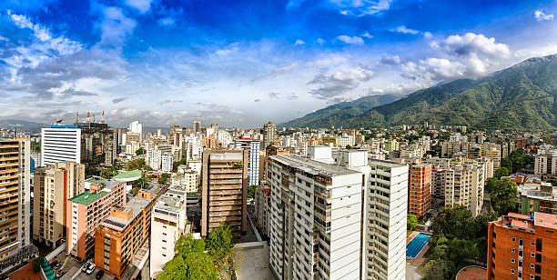 Eastern Caracas cloudscape panoramic city view at mid afternoon Eastern Caracas panoramic city view at Chacao Municipality.  Image taken at mid afternoon with Avila mountain in the background.Cerro El Avila en el Municipio Chacao. caracas stock pictures, royalty-free photos & images