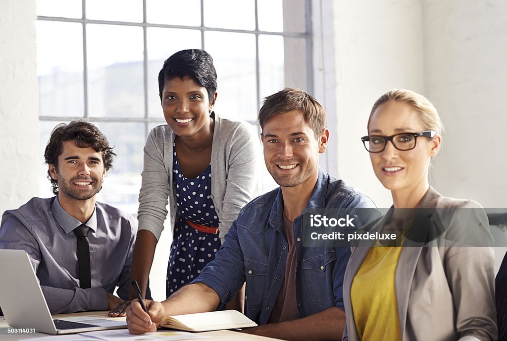 This team knows what they're doing Portrait of a team of young business professionals in an office setting Adult Stock Photo