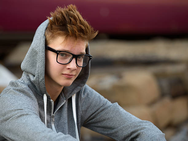 istock Teenager boy outdoors at train station 503114714