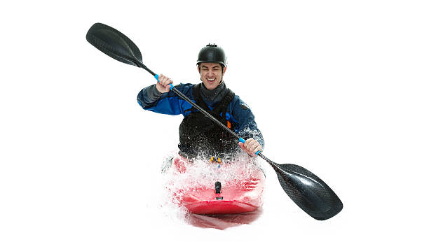istock Smiling kayaker riding kayak 503115041