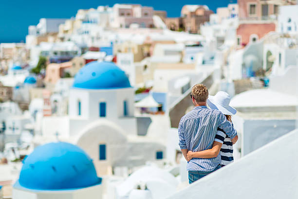 Happy young couple on Santorini island, Greece stock photo