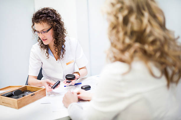 istock Massage therapist with stones 503115605