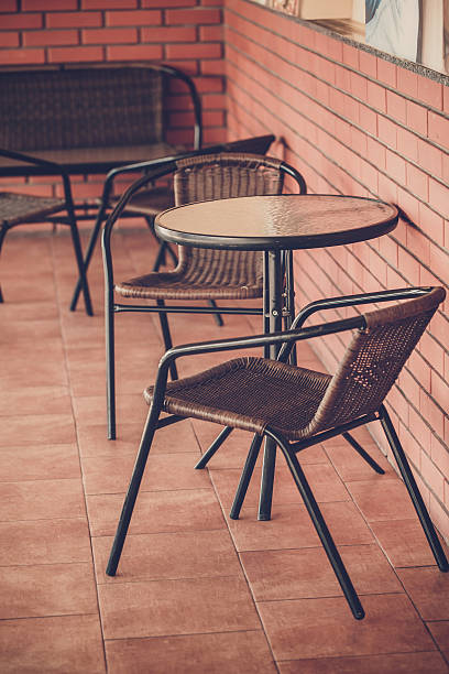istock Typical  coffee terrace with tables and chairs 503116400