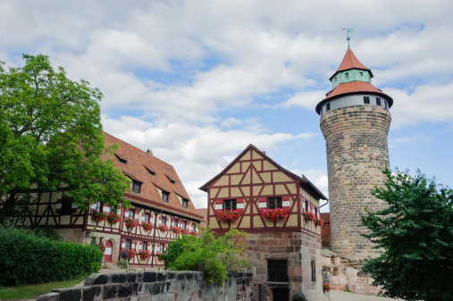 Nuremberg, Germany - August 8, 2012: Kaiserburg is one of the landmarks of the city of Nuremberg. The castle dominates the city from the hill and his profile, with towers and walls, characterizes the skyline of Nuremberg.