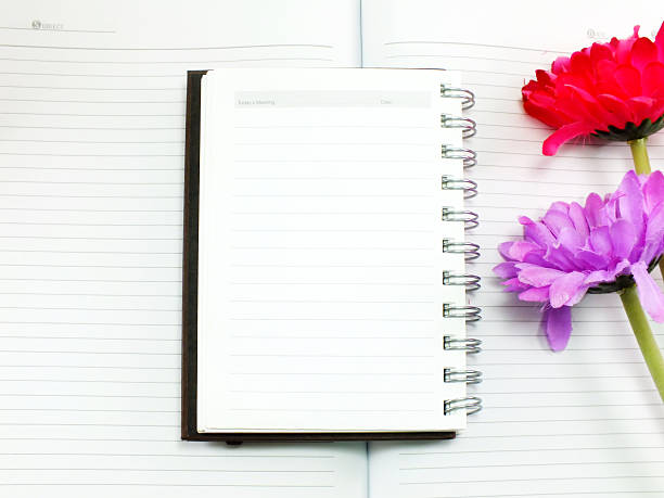 istock note book diary and beautiful flower bouquet background 503118342