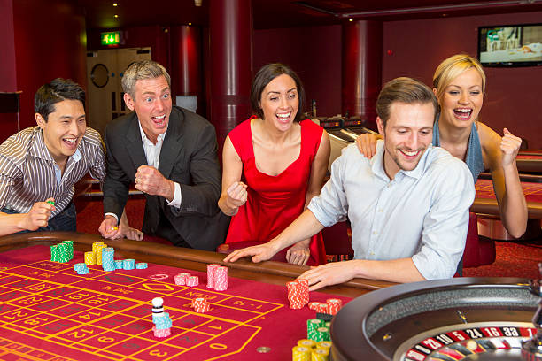 Stacked chips of a lucky player on a table in a casino