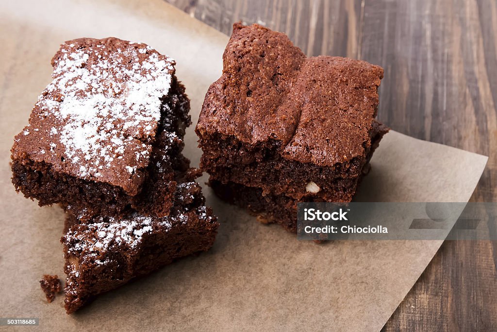 Brownies on the wooden table Brownies  on the wooden table close-up Baked Stock Photo