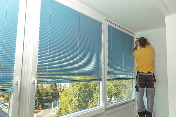 istock Handyman during Home Renovation Finishing Balcony Windows 503118715