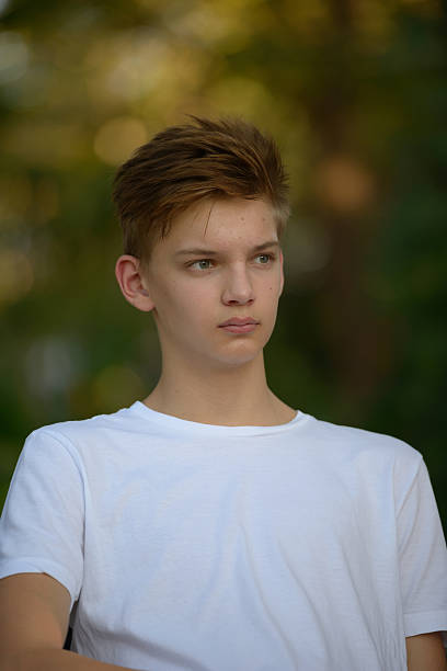 istock Teenager boy outdoors in park 503118786
