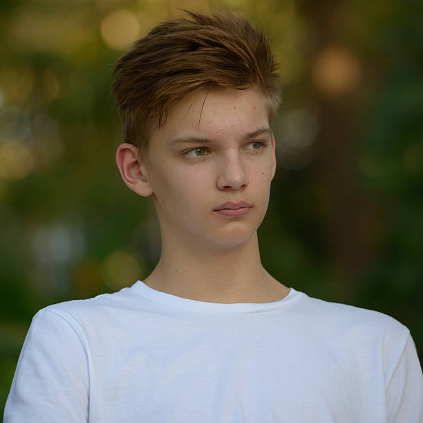istock Teenager boy outdoors in park 503118826