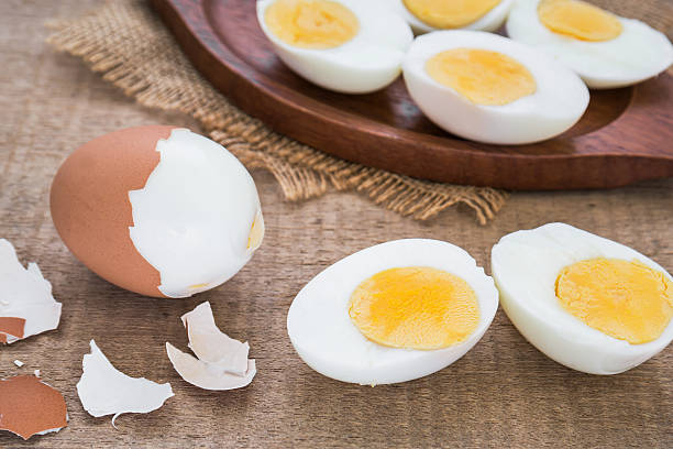 istock Boiled eggs and wooden plate 503119147