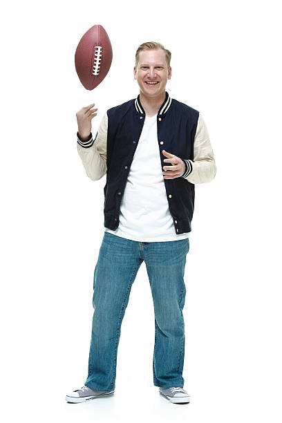 College student throwing a football