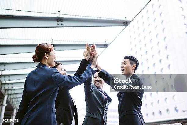 Asian Business Team High Five Stock Photo - Download Image Now - Asia, Asian and Indian Ethnicities, Business Person