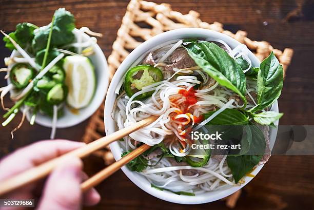 Vietnamese Pho With Spicy Sriracha Sauce Shot Top Down Stock Photo - Download Image Now