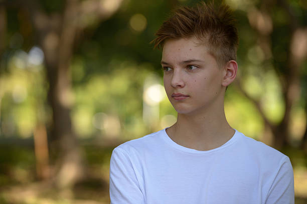 istock Teenager boy outdoors in park 503129986