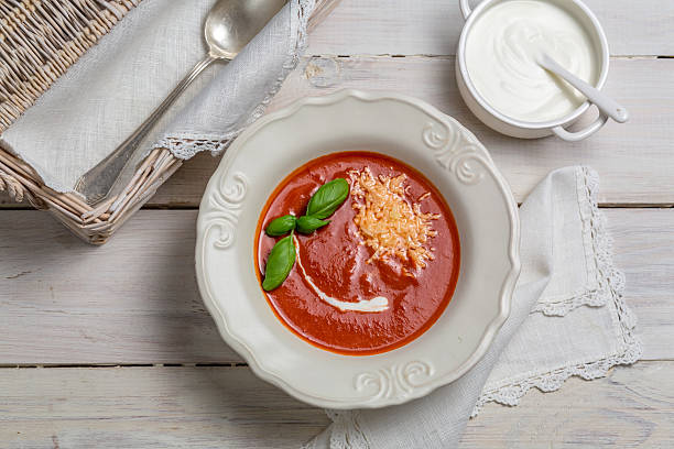 istock Tomato soup with cheese, basil and cream 503132061