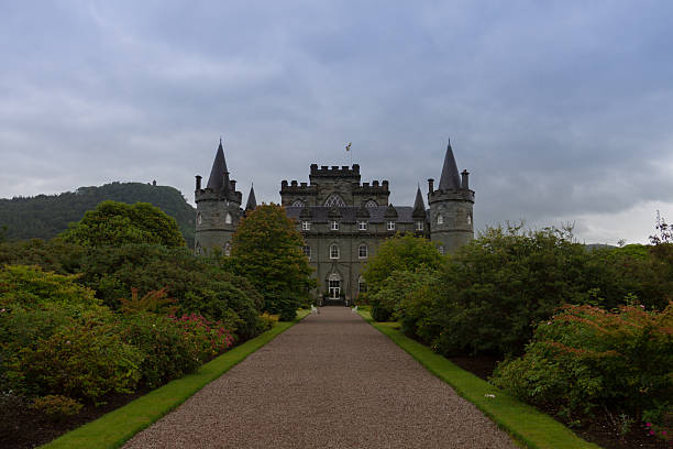 Inverary Castle - Scotland Inveraray, Scotland - July 14th, 2014. One of Scotland's most famous Castles, Inveraray is the ancestral home of the Dukes of Argyll, and is a 'must-see' item on the local tourist itinerary. It lies beside Loch Fyne and the picturesque planned village of Inveraray. loch fyne stock pictures, royalty-free photos & images