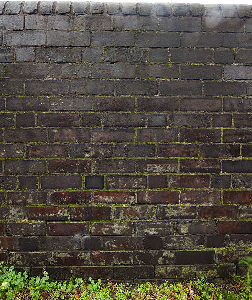 Dark tone brick wall background stock photo