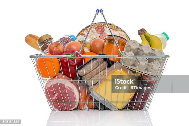 Shopping Basket Full Of Groceries Isolated On White Stock Photo - Download Image Now