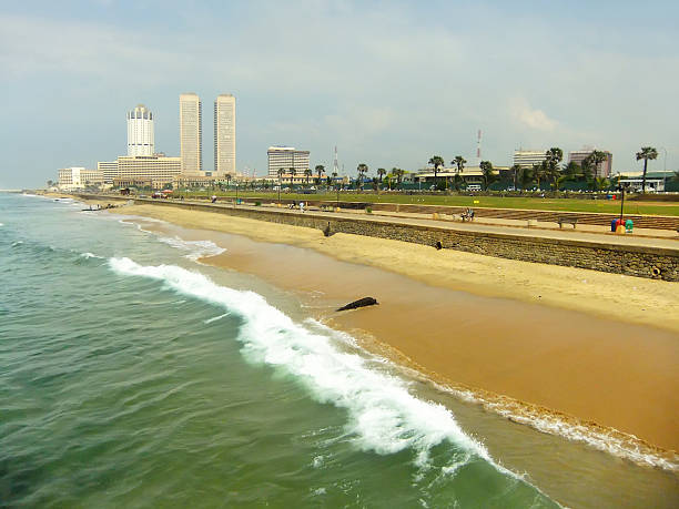 Colombo, Sri Lanka - April 5, 2019: Galle Face Green beach and waterfront park and residential area in Colombo, Sri Lanka
