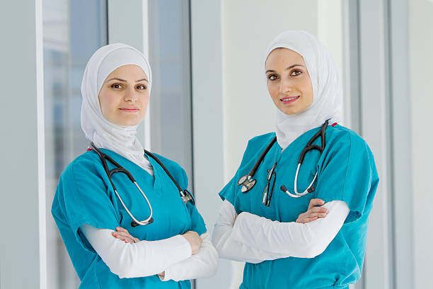 Two Authentic Middle Eastern Healthcare Workers stock photo