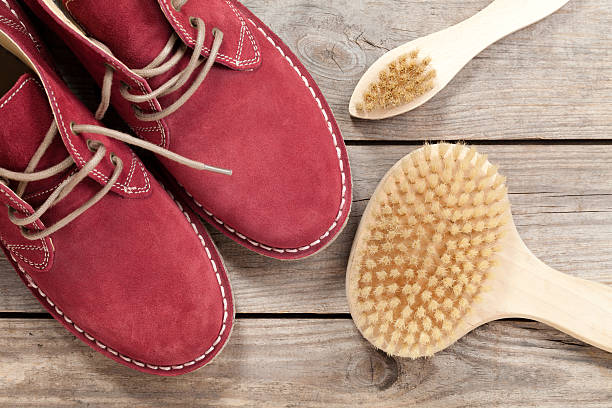 istock Old shoes and Shoe brush 503136517