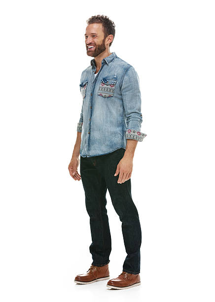 istock Smiling casual man standing and looking away 503136538