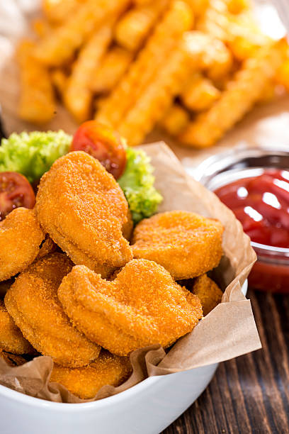 istock Chicken Nuggets with French Fries 503137925