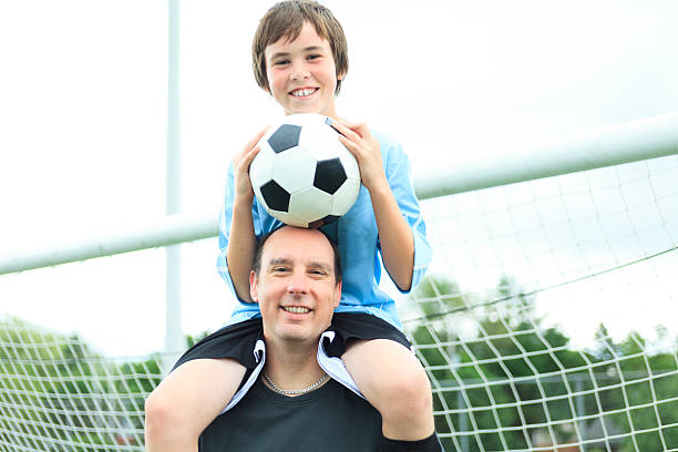 istock Father Son Football 503138501