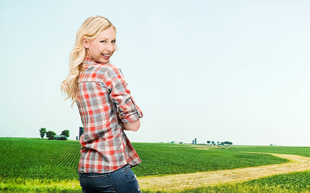 istock Smiling farmer standing in the farm 503139014