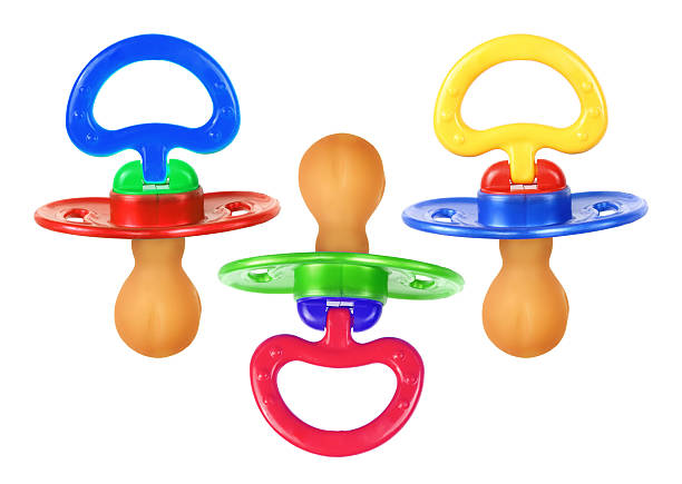 Pacifiers Pacifiers on White Background sooth stock pictures, royalty-free photos & images