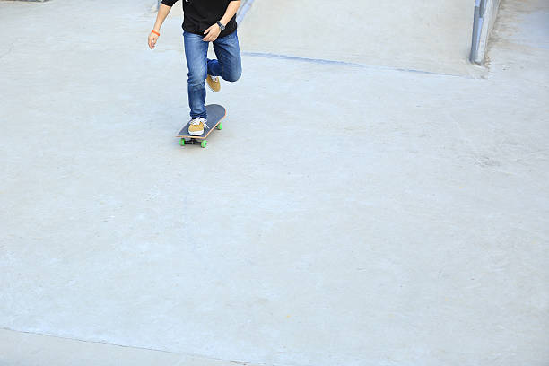 istock skateboarding at skatepark 503141798