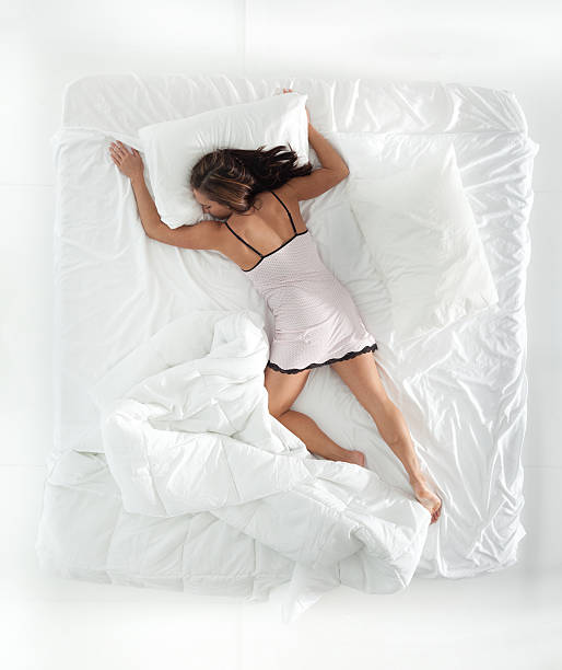 istock Above view of woman sleeping 503142954