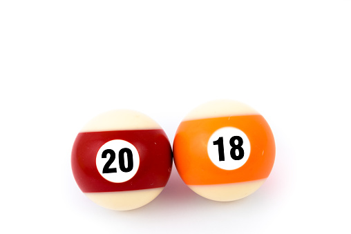 Two billiard balls isolated on a white background, showing together year 2018, happy new year concept