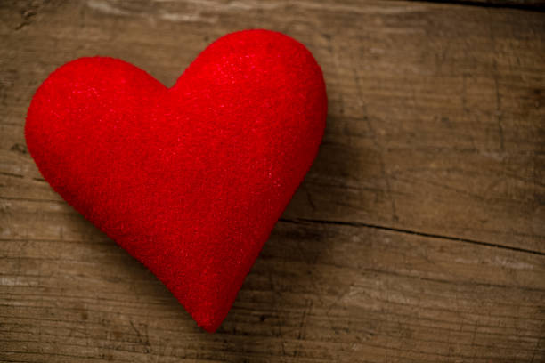 istock Postcard for Valentine's day, Textile heart on wood 503143754