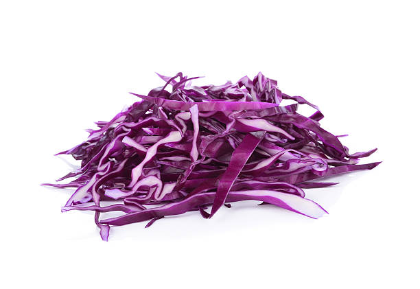 istock pile of cut red cabbage over white background 503144386