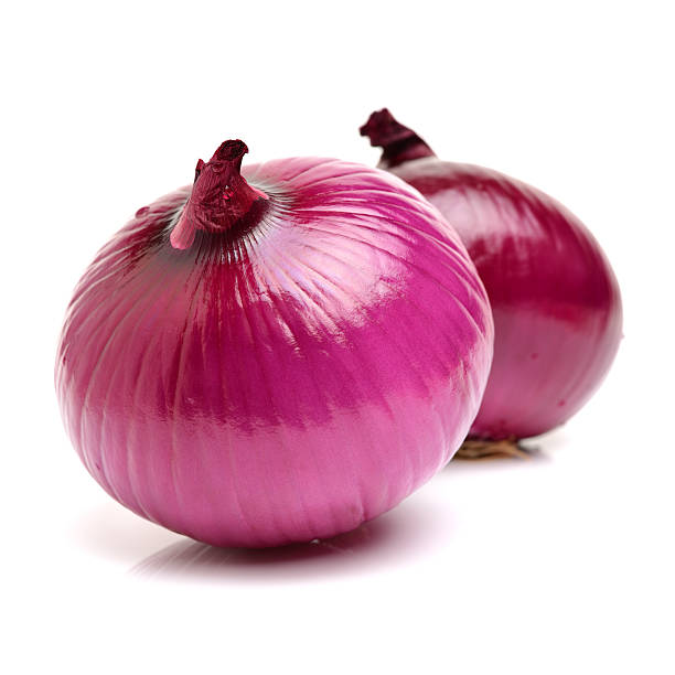 red onion with the outer peel removed, red onion with the outer peel removed, isolated on white. spanish onion stock pictures, royalty-free photos & images